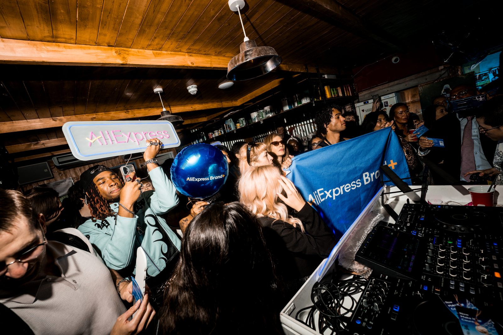 DJ party with AliExpress branding